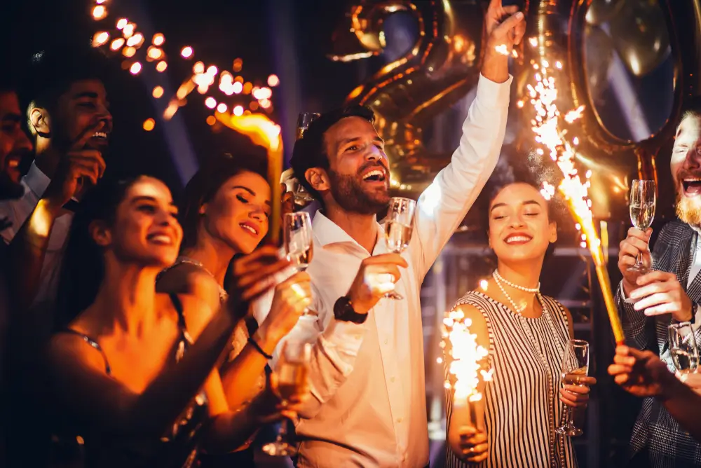 Group of friends celebrating with champagne
